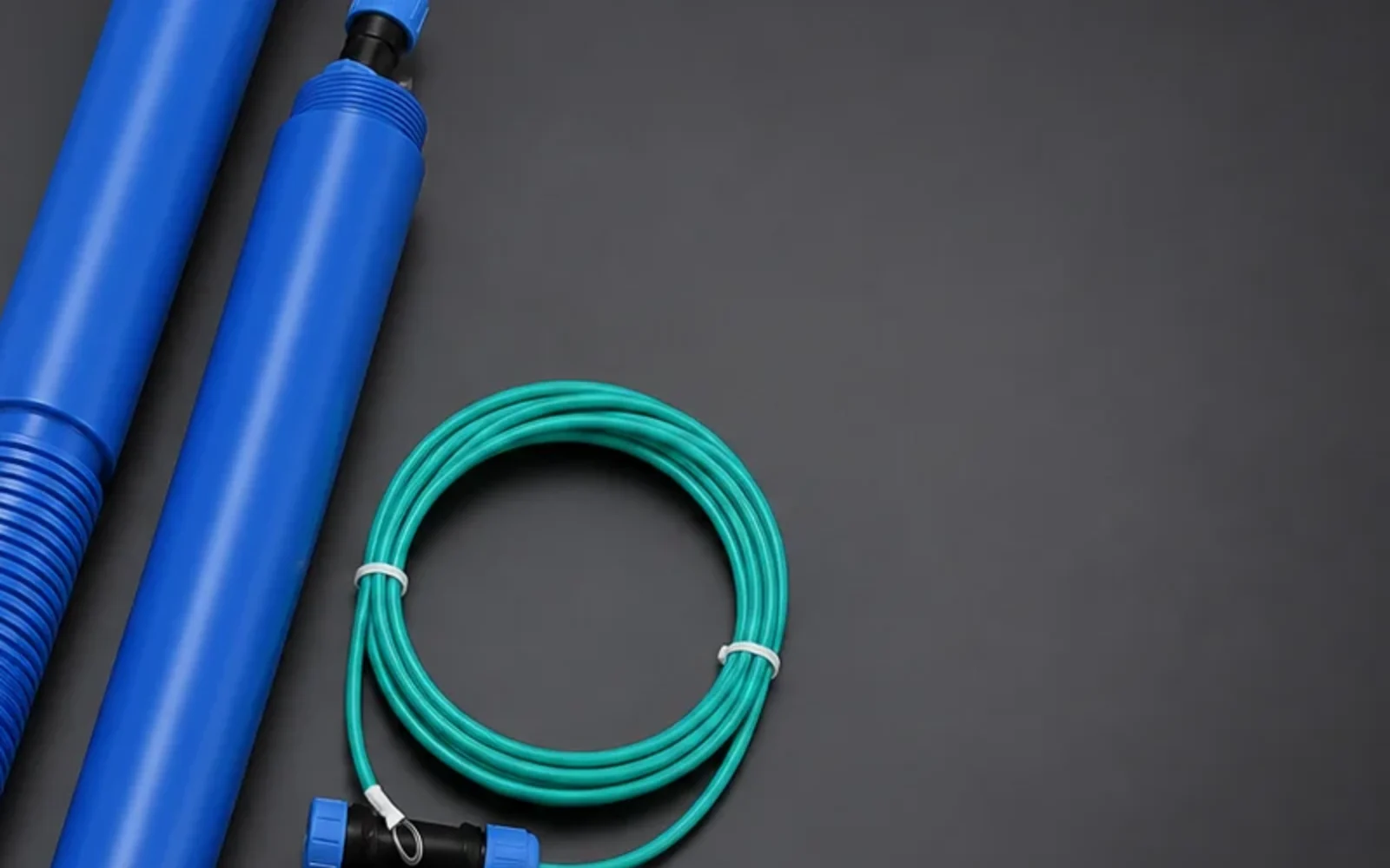Close studio view of permanent reference-electrode housings and cable