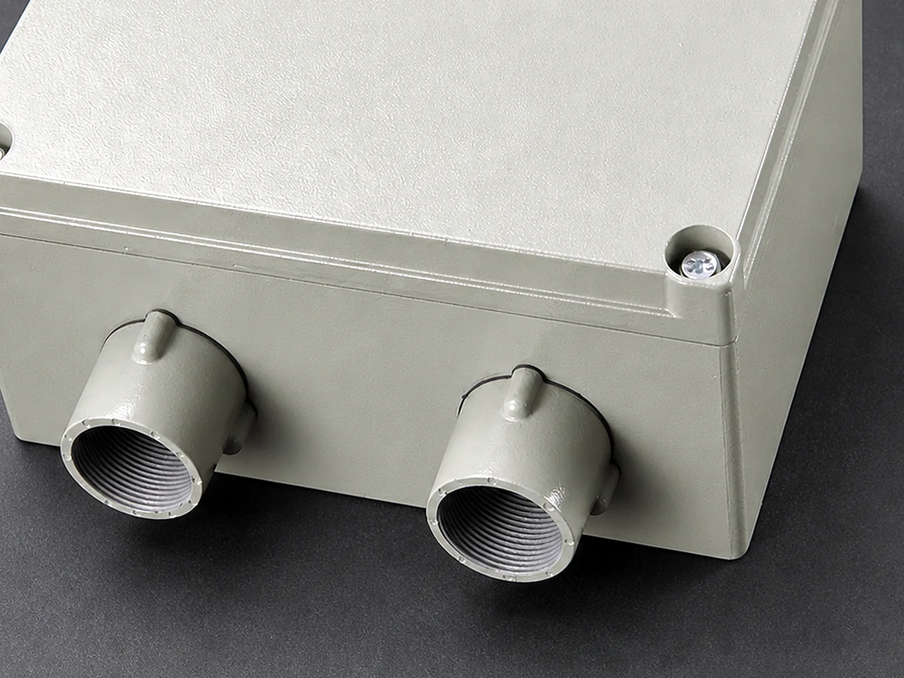 Premium close view of a threaded cable entry on a compact CP enclosure